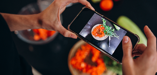 Photographing a freshly prepared dish for a menu