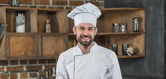 A ChefOM cook ready to prepare your meal